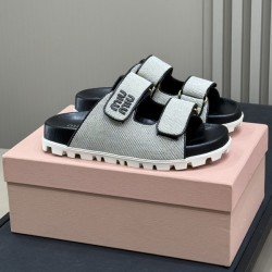 미우미우 캔버스 슬라이드 샌들