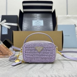 프라다 우븐 원단 및 가죽 미니 파우치 1NR025