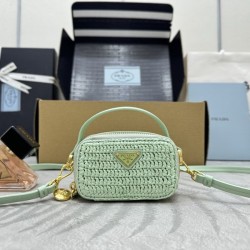 프라다 우븐 원단 및 가죽 미니 파우치 1NR025